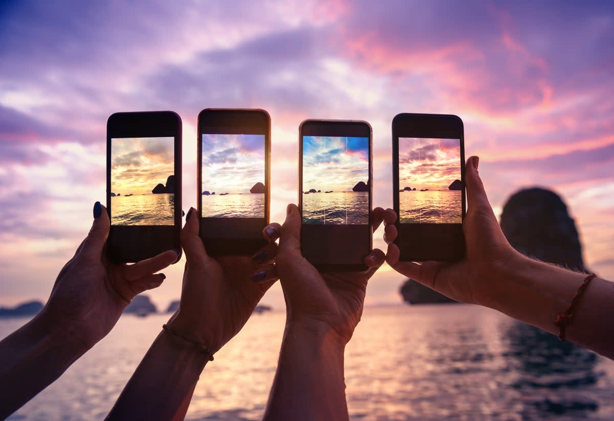 Be conscious of your phone’s place in someone else’s travel memories (Getty Images/iStockphoto)