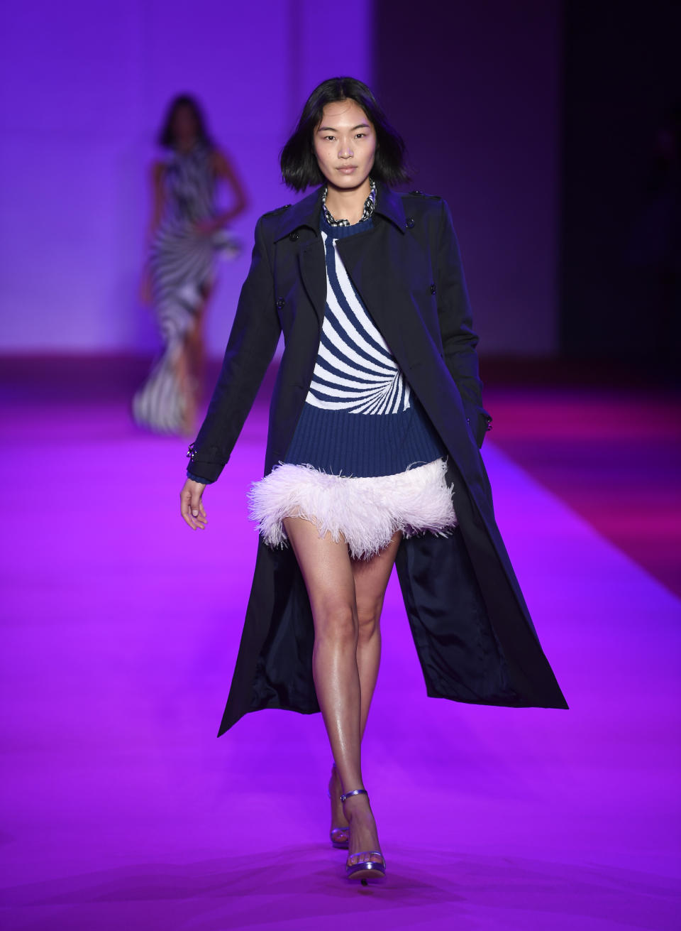 A model walks the runway at the Brandon Maxwell spring/summer 2022 fashion show in the Brooklyn borough of New York during Fashion Week on Friday, Sept. 10, 2021. (Photo by Evan Agostini/Invision/AP)