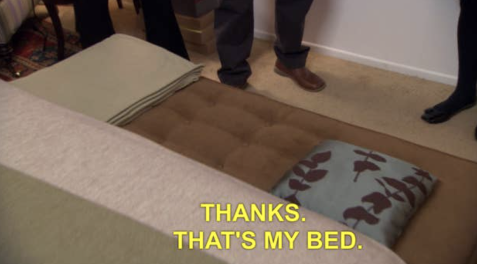 Michael identifying a tiny bench with a cushion on it as his bed