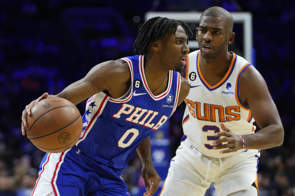 Philadelphia 76ers' Tyrese Maxey, left, tries to get past Phoenix Suns' Chris Paul during the first half of an NBA basketball game, Monday, Nov. 7, 2022, in Philadelphia. (AP Photo/Matt Slocum)