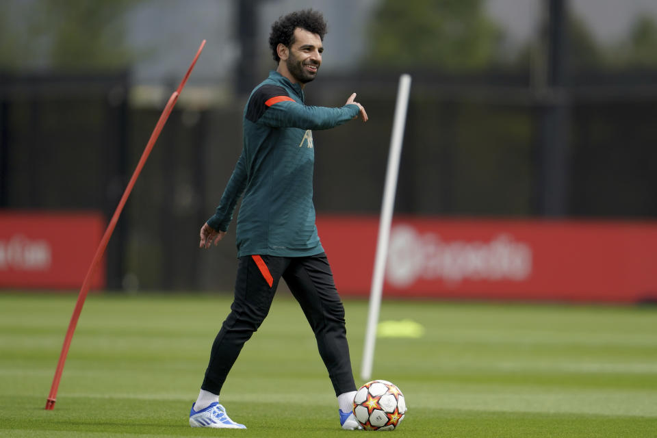 Liverpool's Mohamed Salah controls the ball during a media day and training session ahead of the Champions League final at the training centre in Liverpool, England, Wednesday, May 25, 2022. Liverpool will face Real Madrid in the Champions League final in Paris, France, on Saturday May 28,2022.(AP Photo/Jon Super)