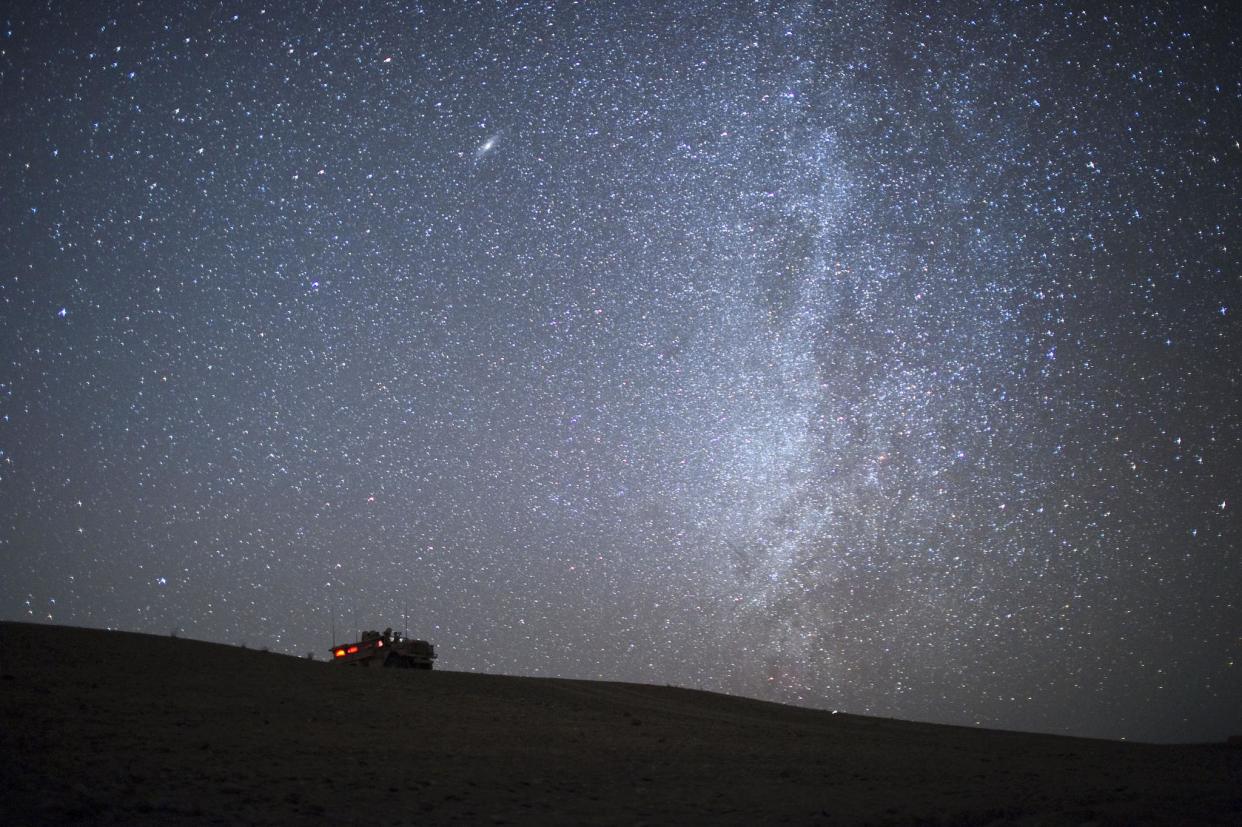 An armoured vehicle of US Marines from 1st Battalion 8th, Bravo is seen in front of The Milky Way: DMITRY KOSTYUKOV/AFP/Getty Images