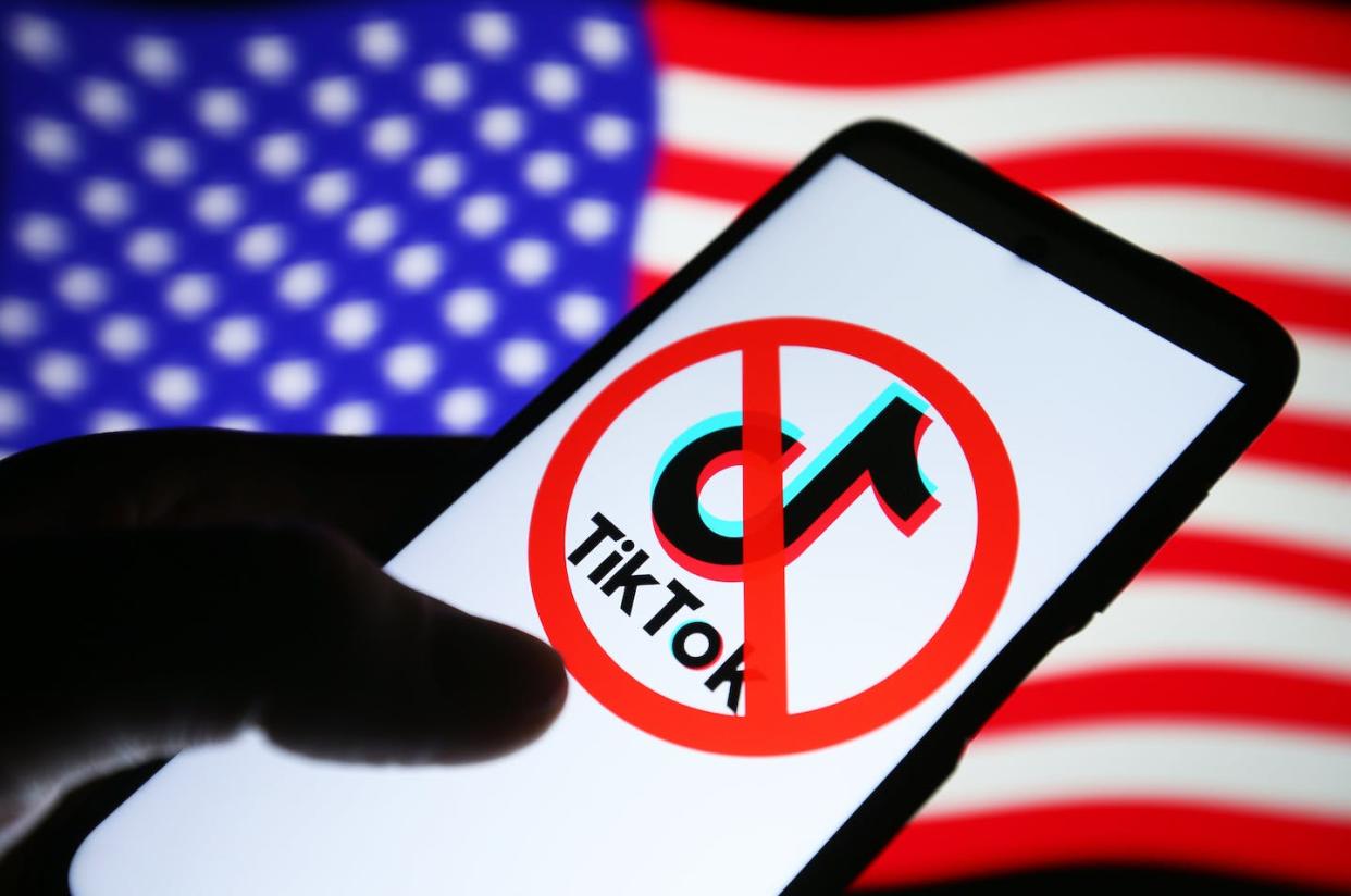 Banning TikTok could unintentionally pose a cybersecurity risk. <a href="https://www.gettyimages.com/detail/news-photo/in-this-photo-illustration-a-crossed-out-tiktok-logo-is-news-photo/1249797505" rel="nofollow noopener" target="_blank" data-ylk="slk:SOPA Images/LightRocket via Getty Images;elm:context_link;itc:0;sec:content-canvas" class="link ">SOPA Images/LightRocket via Getty Images</a>