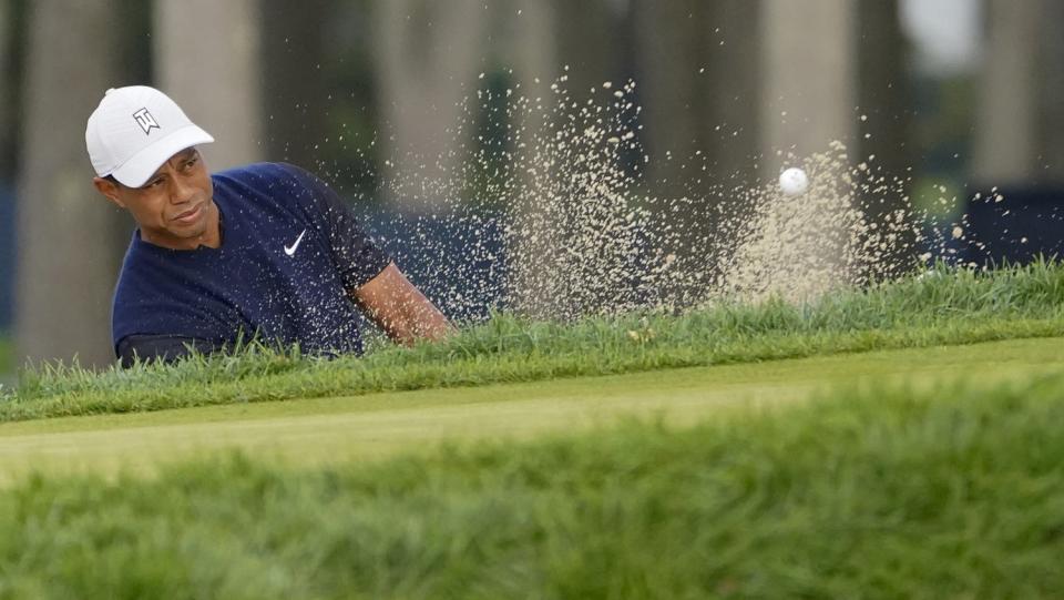 Tiger Woods plays a shot from a bunker on the second hole during the first round of the U.S. Open.