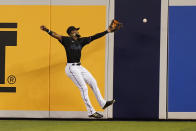 Miami Marlins right fielder Bryan De La Cruz can't make the catch on a double by Pittsburgh Pirates Ke'Bryan Hayes during the first inning of a baseball game Saturday, Sept. 18, 2021, in Miami. (AP Photo/Marta Lavandier)