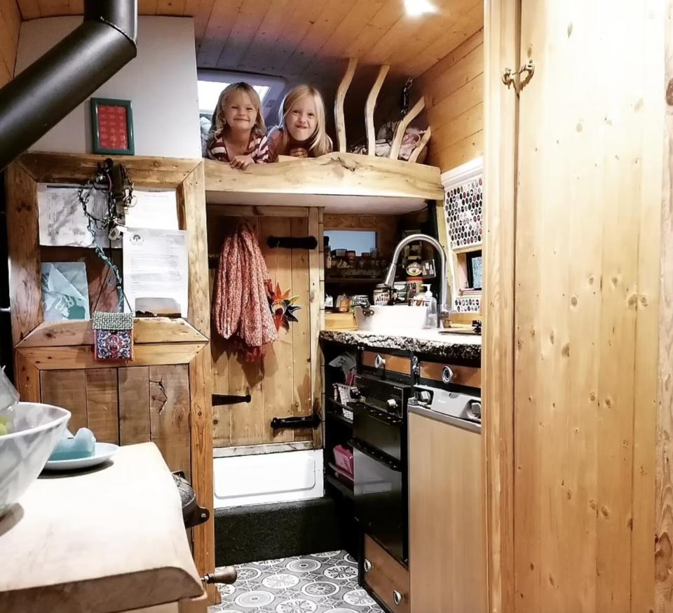 Poppy and Luna Smith, Jess and Dave's daughters, in their bed in the firetruck.