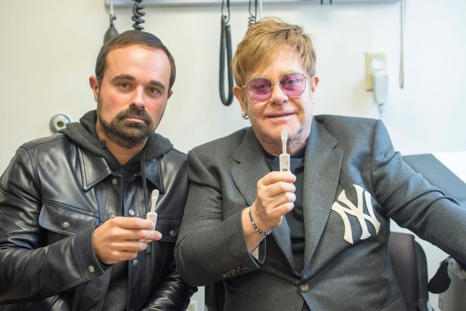 Campaigning: Evgeny Lebedev, proprietor of the Evening Standard, and Sir Elton John at the launch of our AIDSfree appeal. They are holding mouth swabs used as part of the testing kits in Atlanta to demonstrate how easy it is to test for HIV: Jeremy Selwyn