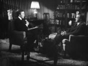 Former President Richard M. Nixon, right, answers questions of David Frost, left, during paid-for interview that was telecast, Wednesday, May 4, 1977. Interview took place at an unidentified home in South Laguna, Calif. Photo from WNEW ? TV monitor. The telecast came 1,000 days after Nixon resigned in disgrace over the Watergate Scandal. (AP Photo/WNEW TV/Ray Stubblebine)