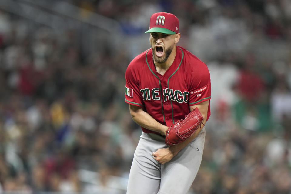 Mexico pitcher Patrick Sandoval reacts after striking out Japan's Munetaka Murakami to end the fourth inning of a World Baseball Classic game, Monday, March 20, 2023, in Miami. (AP Photo/Wilfredo Lee)