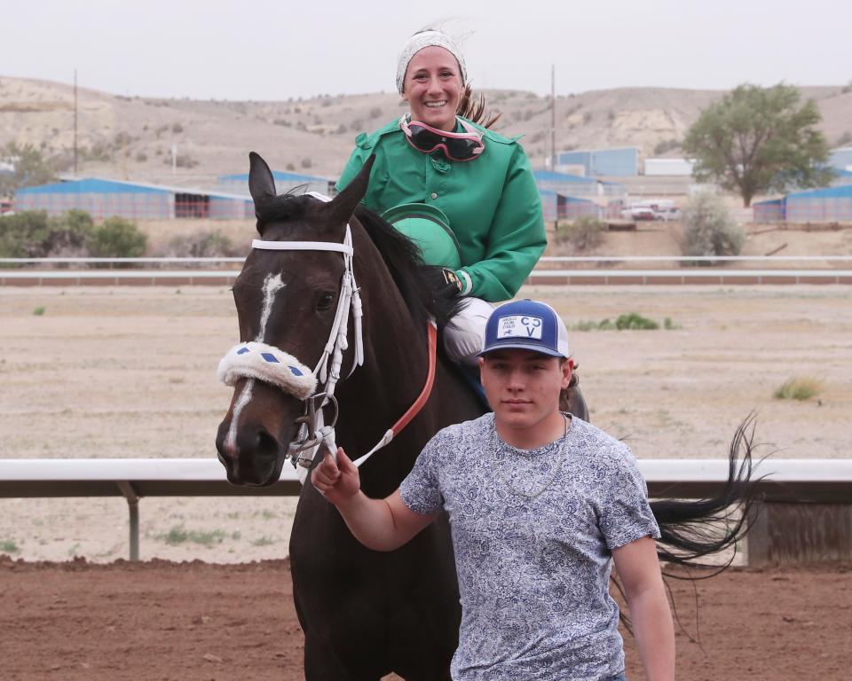 Jockey Joree Scriver arrives at the winners circle with Corrina Corrina after winning the $100,000 Dine Handicap, Sunday, May 29, 2022 at SunRay Park and Casino.