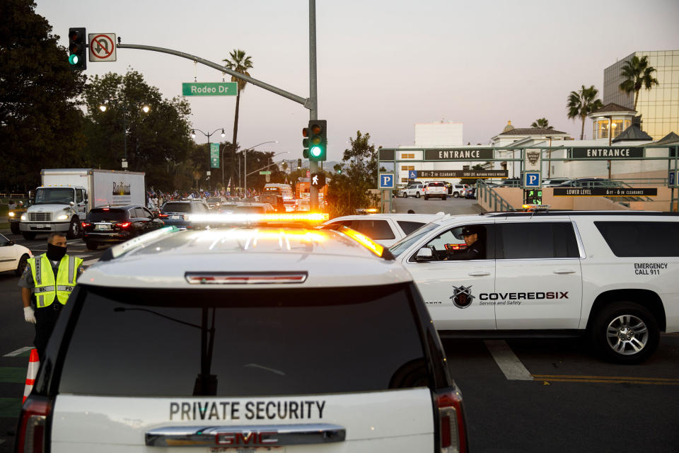 Armed private security guards gather on Rodeo Drive in Beverly Hills, California, on Nov. 1, 2020.<span class="copyright">Patrick T. Fallon—Bloomberg/Getty Images</span>