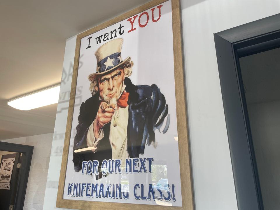 An "I Want You" poster at Morris Knives on May 25, 2023. In addition to their craft, the Morris' also teaching knife making courses.