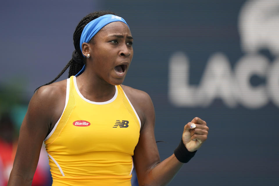 Coco Gauff celebrates a point against Wang Qiang of China, during the Miami Open tennis tournament, Friday, March 25, 2022, in Miami Gardens, Fla. (AP Photo/Wilfredo Lee)