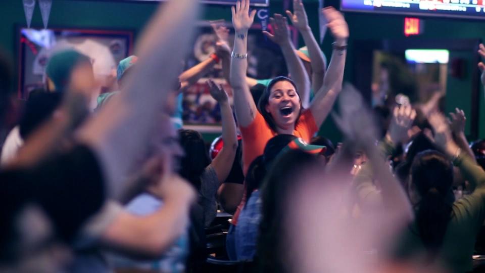 Fans and workers alike go wild during a game at Duffy's Sports Grill.