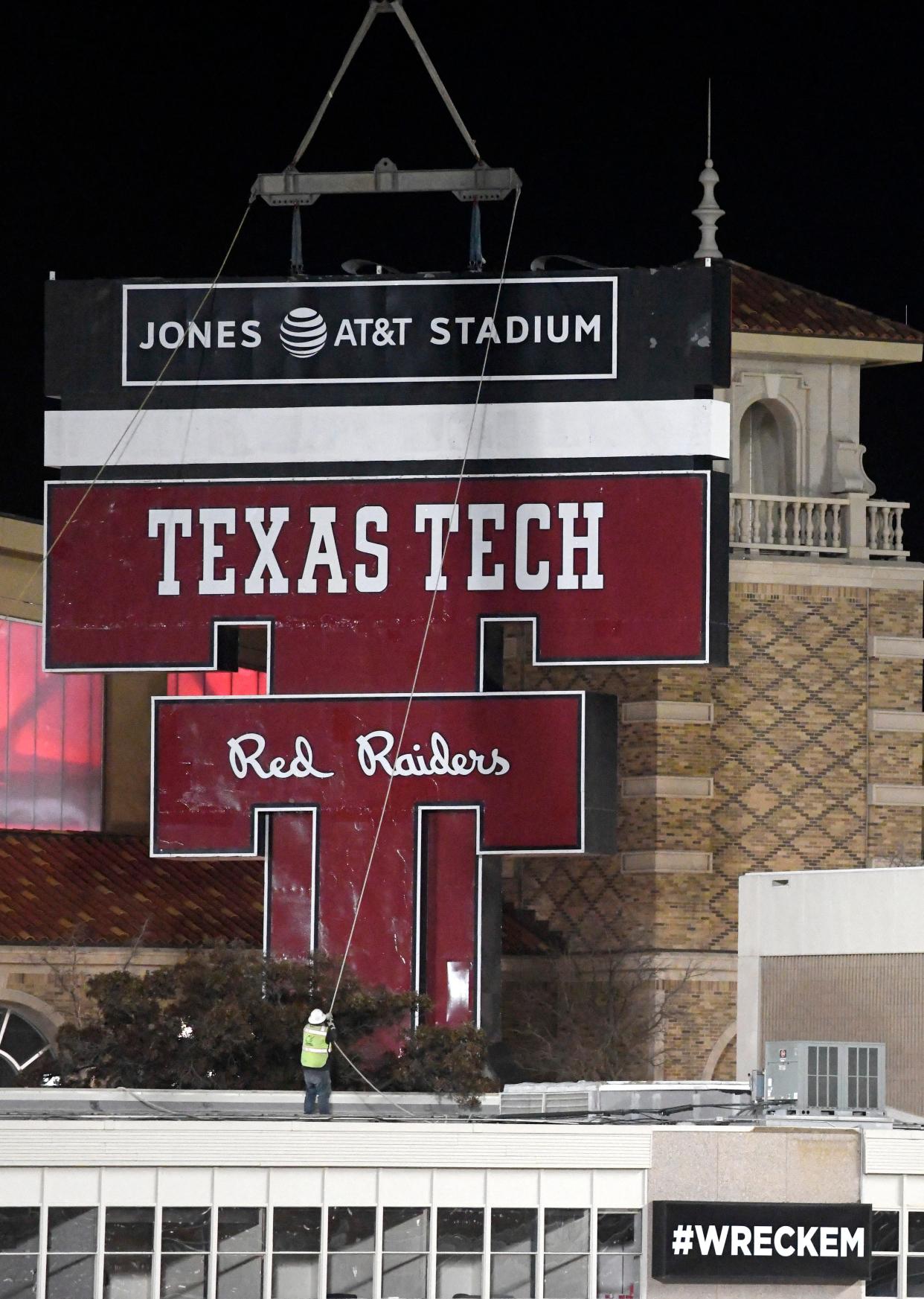 The Double T scoreboard is removed on Thursday night from Jones AT&T Stadium, where it was installed before the 1978. A Lubbock city councilman wants to save the Texas Tech landmark and keep it on prominent display elsewhere.