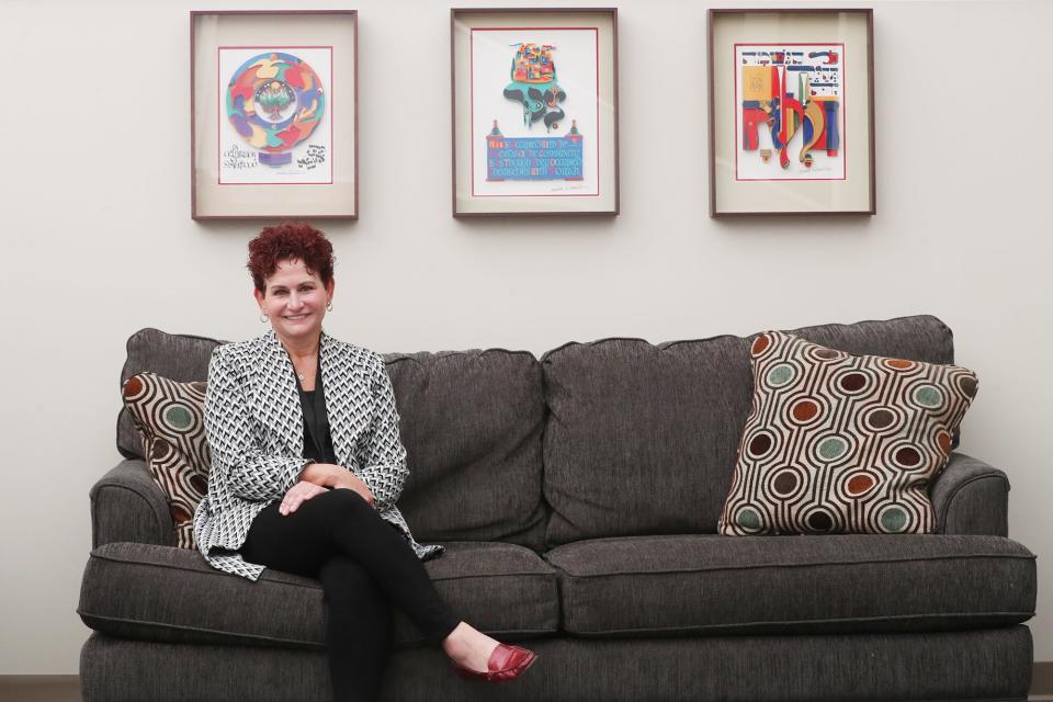 Executive Director Stephanie York sits for a portrait at the Shaw JCC on White Pond Drive in Akron.