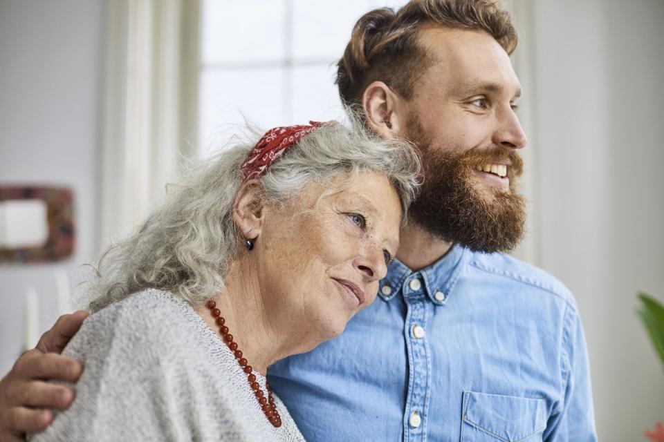 mother and smiling adult son