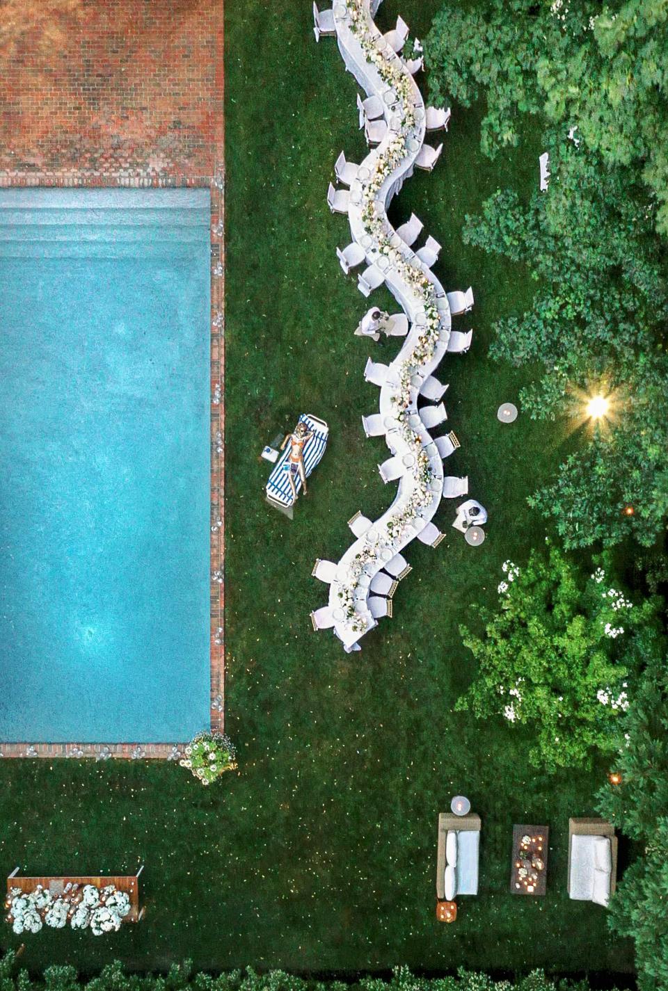 The Bride and Groom Said Their Vows Beneath a Floral Chuppah at This Hamptons Backyard Wedding