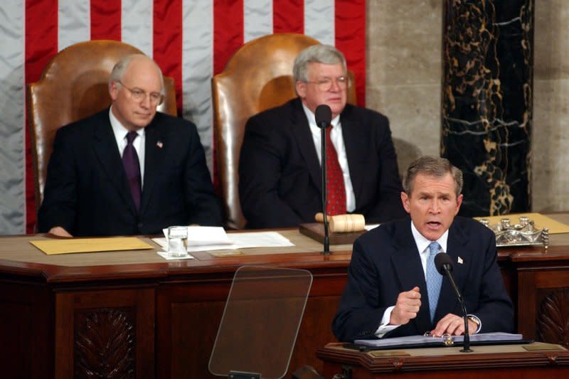 President George W. Bush addresses the nation during his first State of the Union on January 29, 2001, in Washington as Vice President Richard Cheney (L) and Rep. Dennis Hastert, R-Ill., listen on. File photo by Michael Kleinfeld/UPI