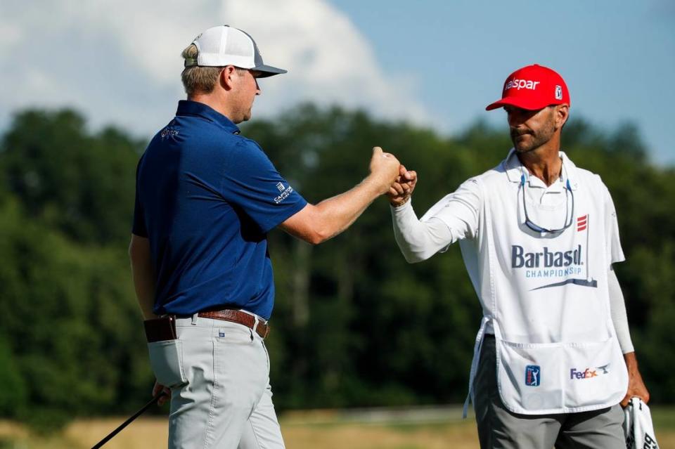 Trey Mullinax celebrates with his caddie Julien Trudeau after winning the PGA Barbasol Championship last year. That victory remains Mullinax’s only win on the PGA Tour.