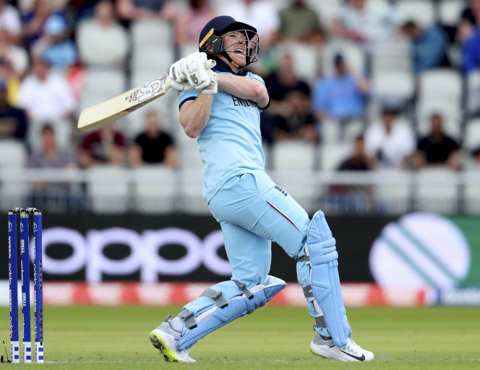 England's captain Eoin Morgan bats during the Cricket World Cup match between England and Afghanistan at Old Trafford in Manchester, England, Tuesday, June 18, 2019. (AP Photo/Rui Vieira)