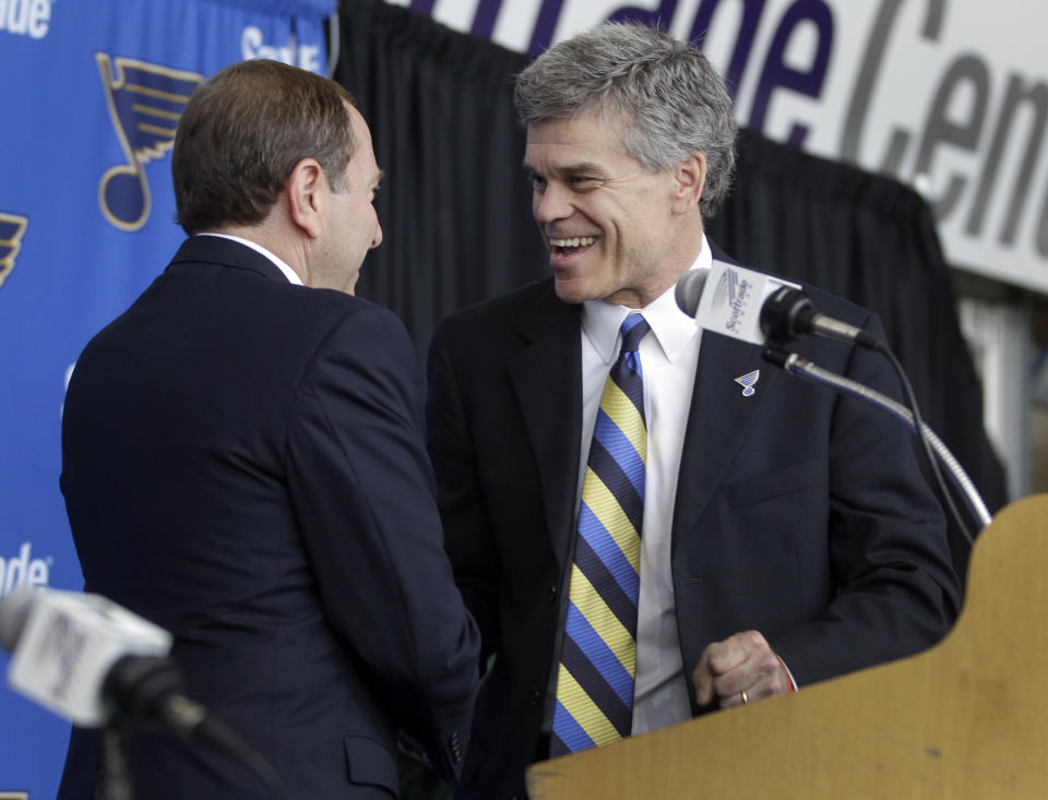 Tom Stillman, right, shakes hands with NHL commissioner Gary Bettman during a news conference announcing the sale of the St. Louis Blues hockey team to a group headed by Stillman Thursday, May 10, 2012, in St. Louis. Stillman becomes the eighth owner of the Blues since the franchise started in 1966. (AP Photo/Jeff Roberson)