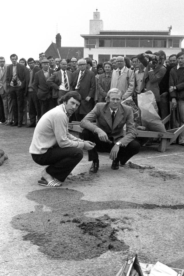 Australia captain Ian Chappell England skipper Tony Greig inspect the vandalised pitch after the third Ashes Test in 1975 was abandoned due to a damaged pitch. Campaigners for the release of George Davis - who had been convicted of armed robbery - dug up the pitch and covered it in oil. Australia went on to win the series 1-0