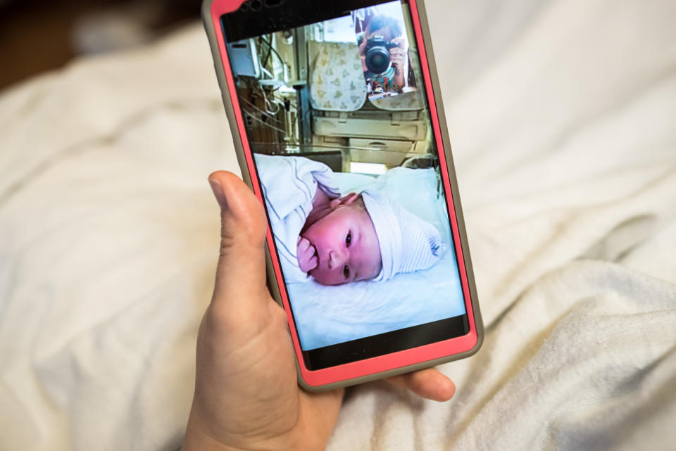 "This is a shot I took as a mother was face-timing her husband, who was in the nursery while the baby was being observed."