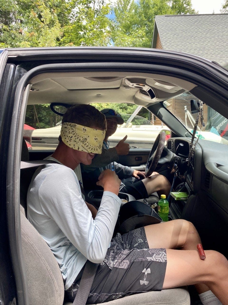 Brendan Papesh blindfolds his friend Riley Hemme on their way to a secret fishing spot over the summer. The two are competing neck and neck for the title of master angler from the Wisconsin Interscholastic Fishing Association.