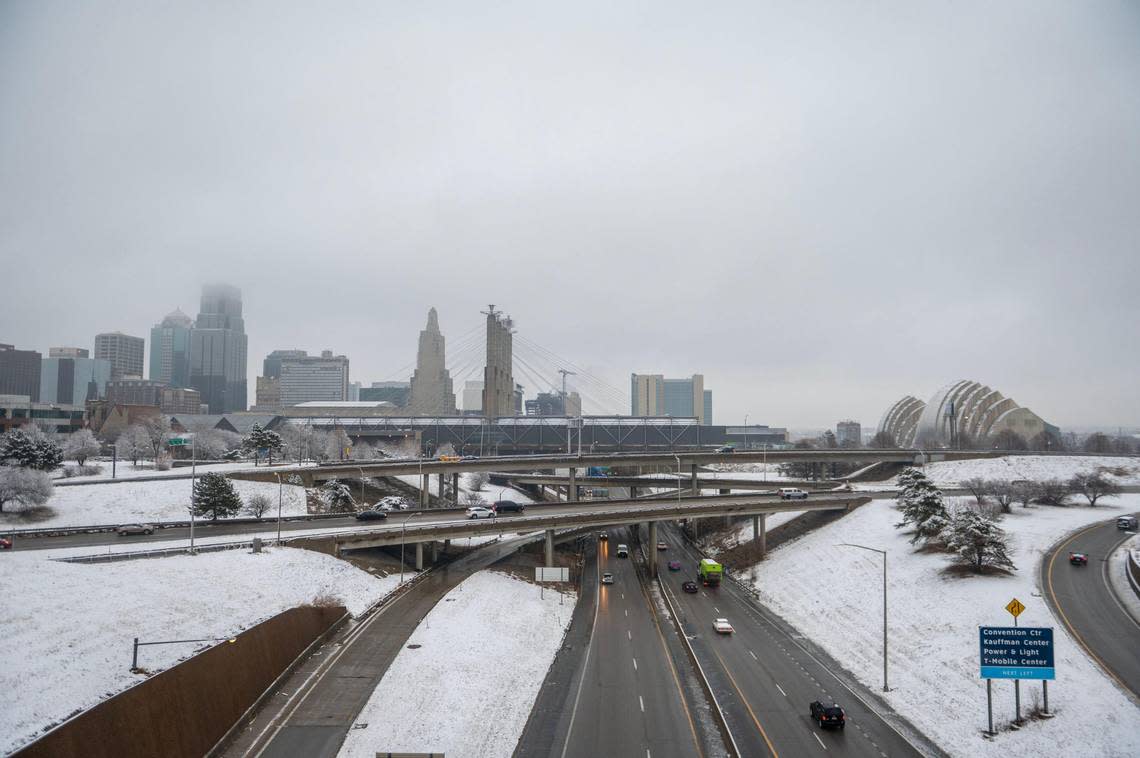 Commuters make their way on the highways near downtown Kansas City after an overnight snowstorm passed through the metro on Wednesday, Jan. 25, 2023.