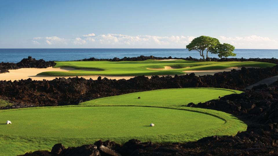 The par-3 17th is in the debate for best views on the Big Island. (Courtesy Four Seasons Hualalai Resort)