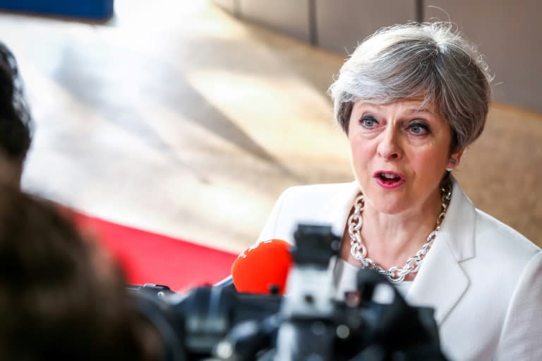 Britain's Prime Minister Theresa May speaks to the press as she arrives for a summit of European Union leaders in Brussels on June 23, 2017