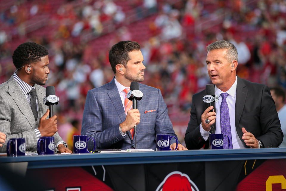 Fox college sports anchors Reggie Bush, Matt Leinart and Urban Meyer after a college football game between the Utah Utes and The USC Trojans on September 20, 2019, at the Los Angeles Memorial Coliseum in Los Angeles, CA. (Photo by Jordon Kelly/Icon Sportswire via Getty Images)