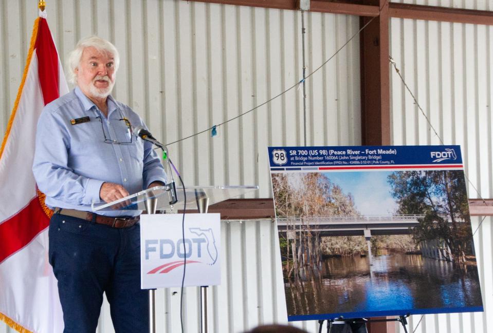 Fort Meade Mayor James Watts addresses the audience Friday at a celebrating to mark construction on a replacement to the John Singletary Bridge. Watts said some residents drive 30 extra miles to avoid traveling on the narrow bridge over the Peace River.