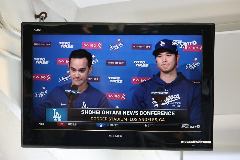 A view of a TV in the press box as Shohei Ohtani #17 of the Los Angeles Dodgers speaks during a press conference at Dodger Stadium on March 25, 2024 in Los Angeles, California.