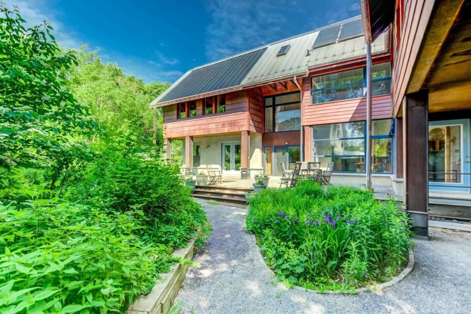 The two-storey eco-house is nearly 7,000 square feet, made out of straw bale encased in plaster.