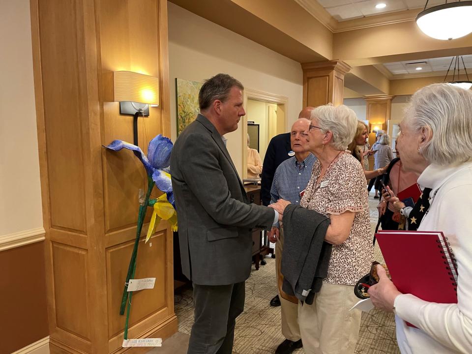 Gov. Chris Sununu talks with attendees of his State of the State address in Exeter on Tuesday, June 27, 2023 at The Boulders at RiverWoods.