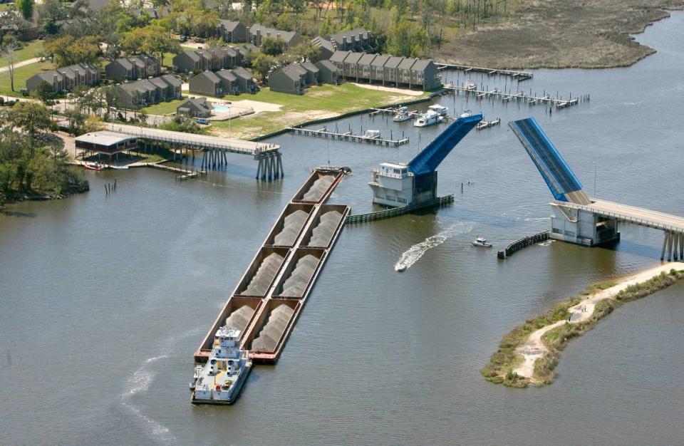 An aerial photograph of damage to the Popp’s Ferry Bridge after being hit by a barge in 2009. The barge took out a large section of the span on the south side of the drawbridge.