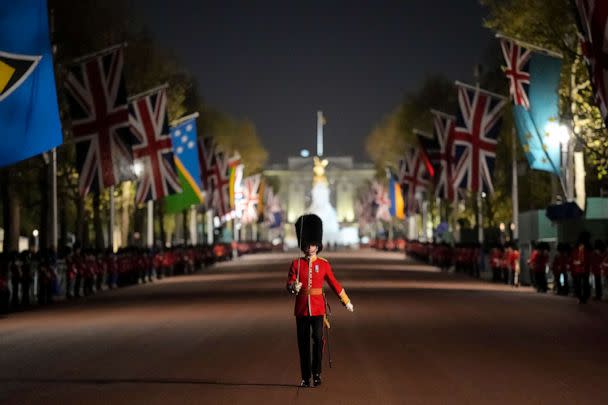 PHOTO: A member of the military marches on The Mall, in central London, early Wednesday, May 3, 2023, during a rehearsal for the Coronation of King Charles III (Andreea Alexandru/AP)