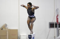 Gabby Douglas competes on the balance beam at the American Classic Saturday, April 27, 2024, in Katy, Texas. (AP Photo/David J. Phillip)