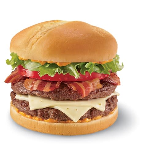 Dairy Queen 1/2 lb. FlameThrower GrillBurger. Calories 990, Fat 64 g (Saturated Fat 23 g and Trans Fat 1.5 g), Sodium 1,530 mg, Carbohydrates 42 g, Sugar 4 g. <em>(Photo: Dairy Queen)</em>