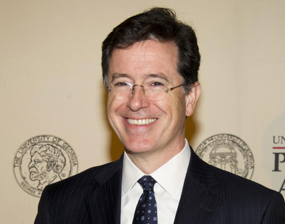 FILE - In this May 21, 2012 file photo, TV personality and author Stephen Colbert attends the 71st Annual Peabody Awards in New York. Colbert, author of "America Again: Re-becoming the Greatness We Never Weren't," will appear at BookExpo America on Tuesday, June 5. (AP Photo/Charles Sykes, file)