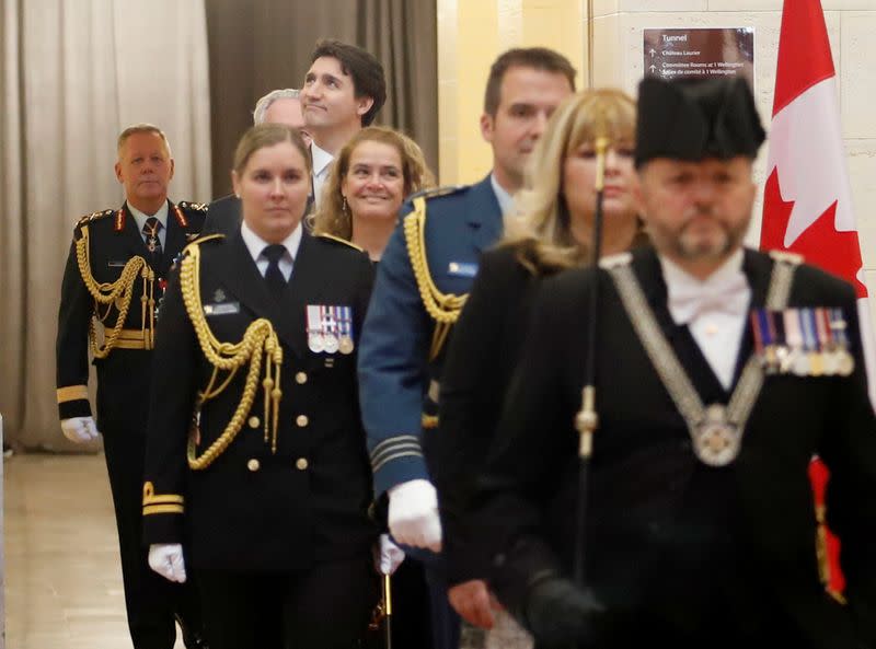 Canada's Governor General Julie Payette and Canada's Prime Minister Justin Trudeau walk to the Senate chamber ahead of the speech from the throne in Ottawa