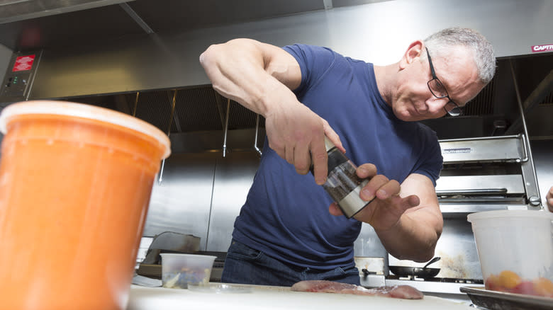 Chef Robert Irvine cooking