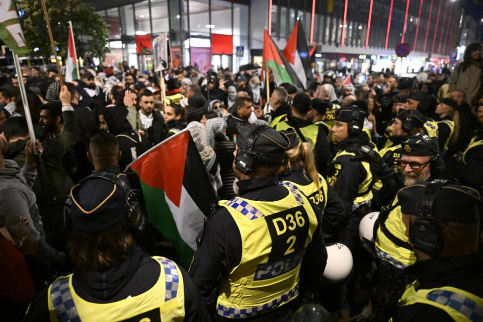 Police face pro-Palestinian protesters in Malmo during the Eurovision semi-final on 9 May 2024 (TT NEWS AGENCY/AFP via Getty Ima)
