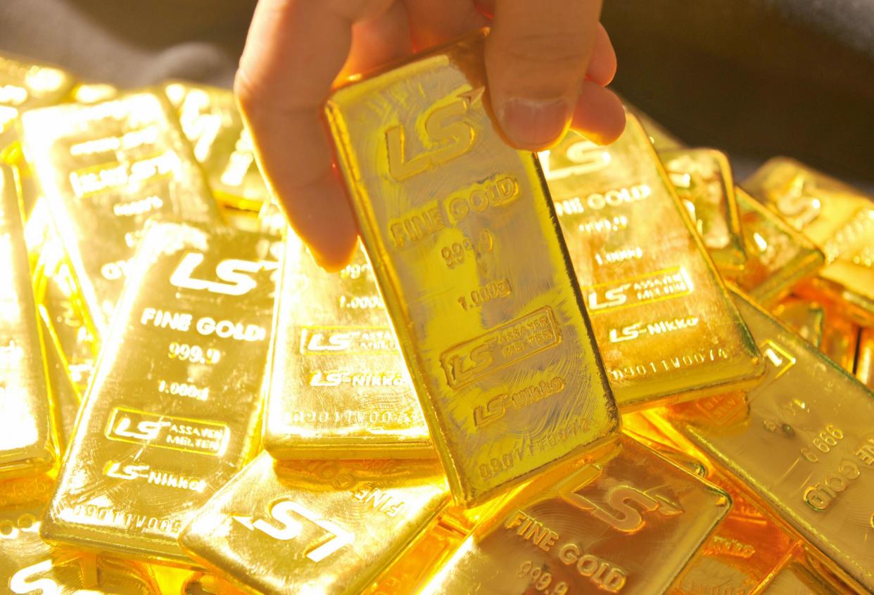 A cleaner found seven gold bars while emptying bins in an airport: AFP/Getty Images