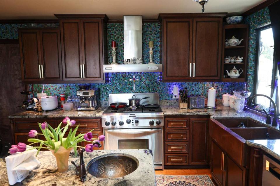 Mosaic tiles accent the kitchen in the San Luis Obispo home owned by Bruce and Suki Mason, seen here on May 10, 2024.
