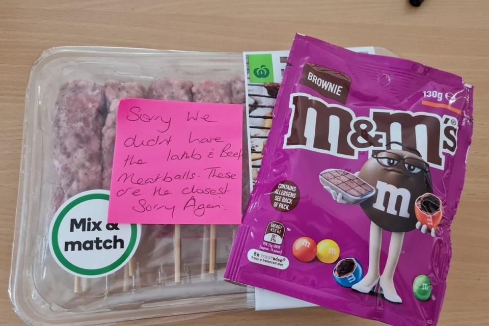 Photo of handwritten note and M&M's Brownie from Woolworths staff