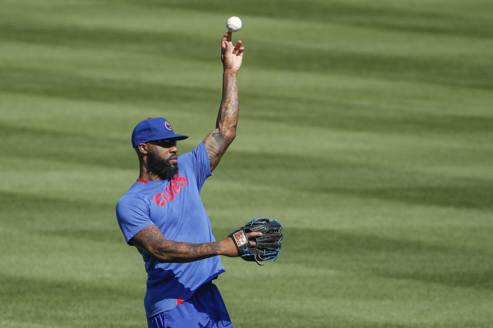 Chicago Cubs right fielder Jason Heyward throws the ball during baseball practice at Wrigley Field on Friday, July 3, 2020 in Chicago. (AP Photo/Kamil Krzaczynski)