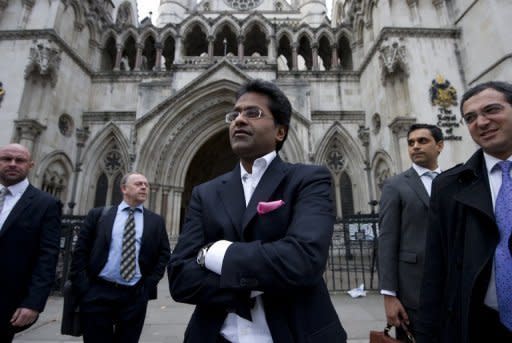 Ex-chairman of India's cricket IPL, Lalit Modi (C), leaves the High Court in central London on March 5, 2012, after a hearing in a libel case brought against him by former New Zealand cricketer Chris Cairns. Cairns has won the libel action, leaving Modi facing a bill of more than Â£500,000 ($794,000)